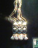 El escarabeo fue un amuleto de vida y poder, con forma de escarabajo pelotero (Scarabaeus sacer egipcio), que representaba al Sol naciente, y era símbolo de la resurrección en la mitología egipcia.